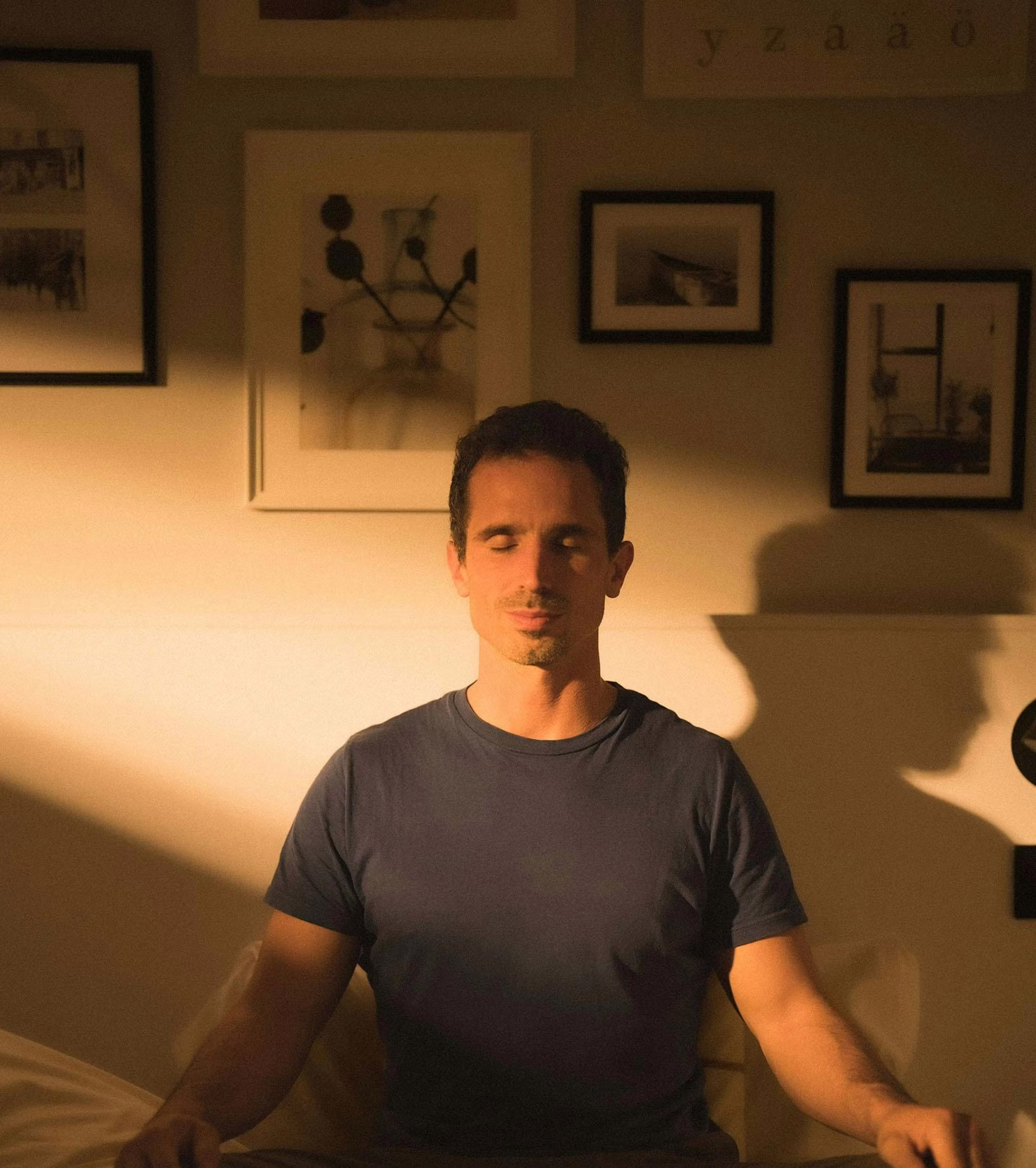 Man meditating in a quiet room